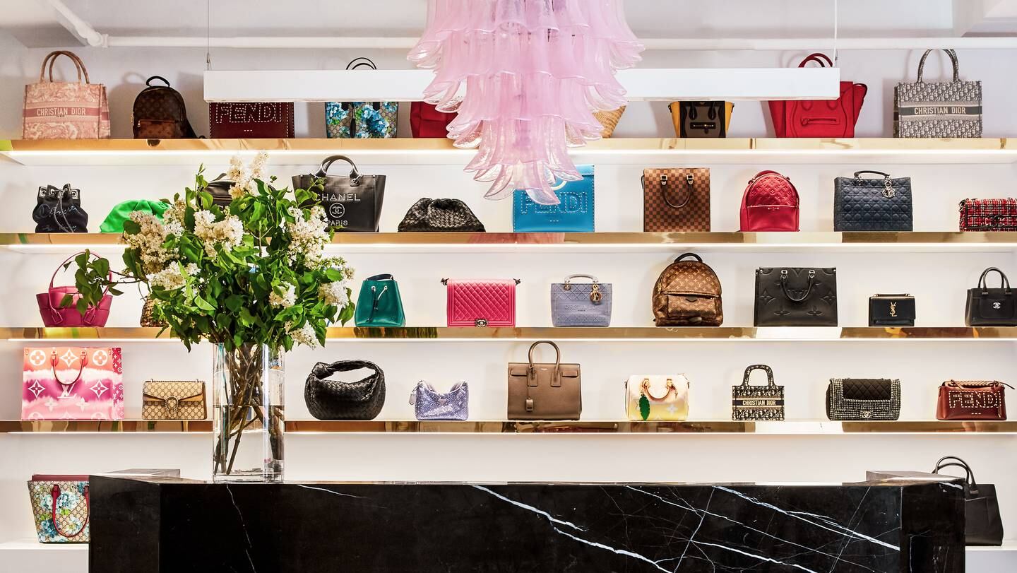 Handbags on a shelf.
