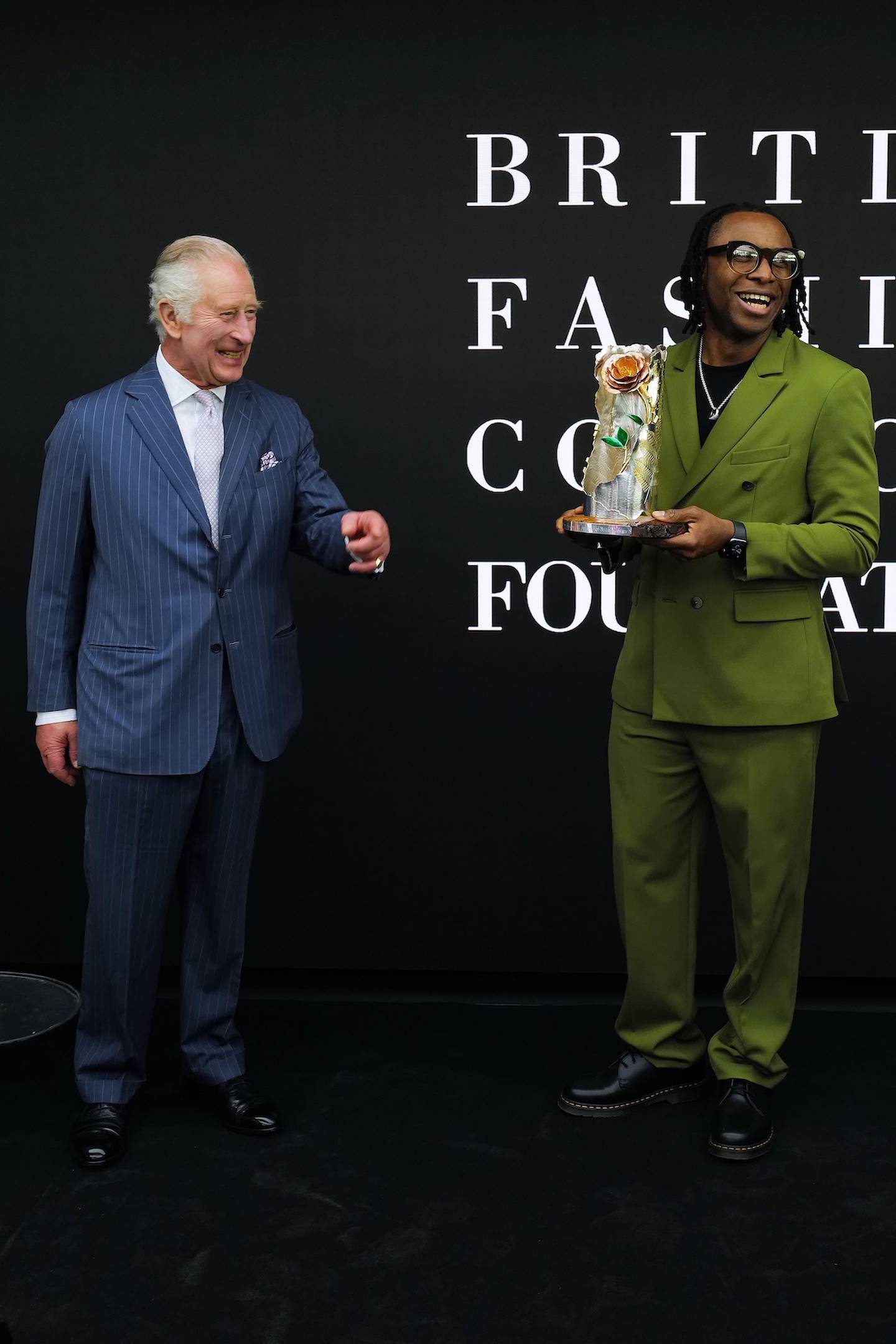 King Charles III and Labrum London attend the British Fashion Council Foundation Impact Day 2023 at 180 The Strand on May 18, 2023 in London, England. (Photo by Darren Gerrish/Getty Images for The BFC)
