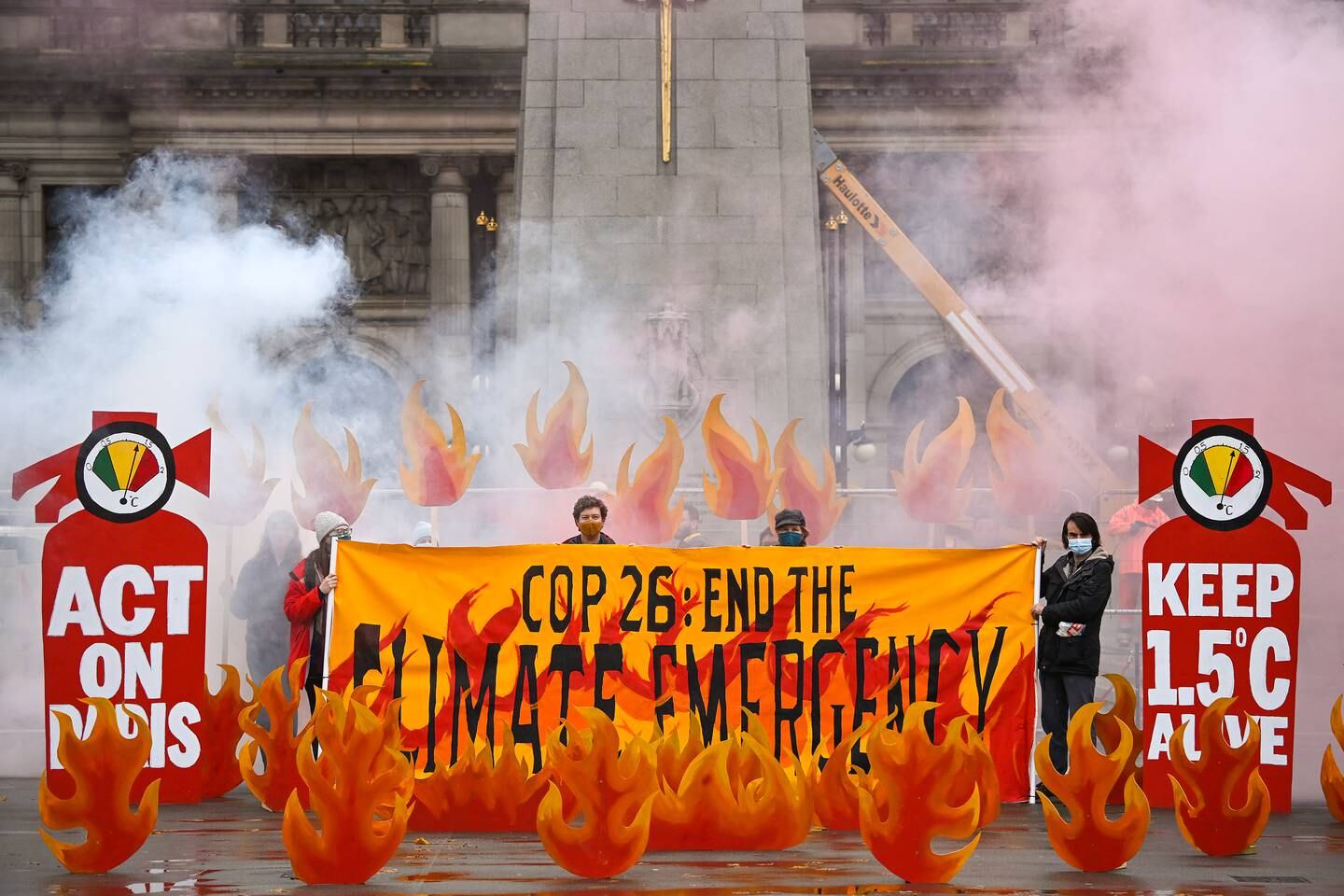 Activists will welcome world leaders to COP26 with a field of climate fire in George Square in Glasgow, Scotland. The group symbolically set George Square “on fire” with an art installation of faux flames, smoke, and banners, showcasing the climate emergency, and massive fire extinguishers highlighting actions world leaders should take at the upcoming COP26 climate negotiations.
