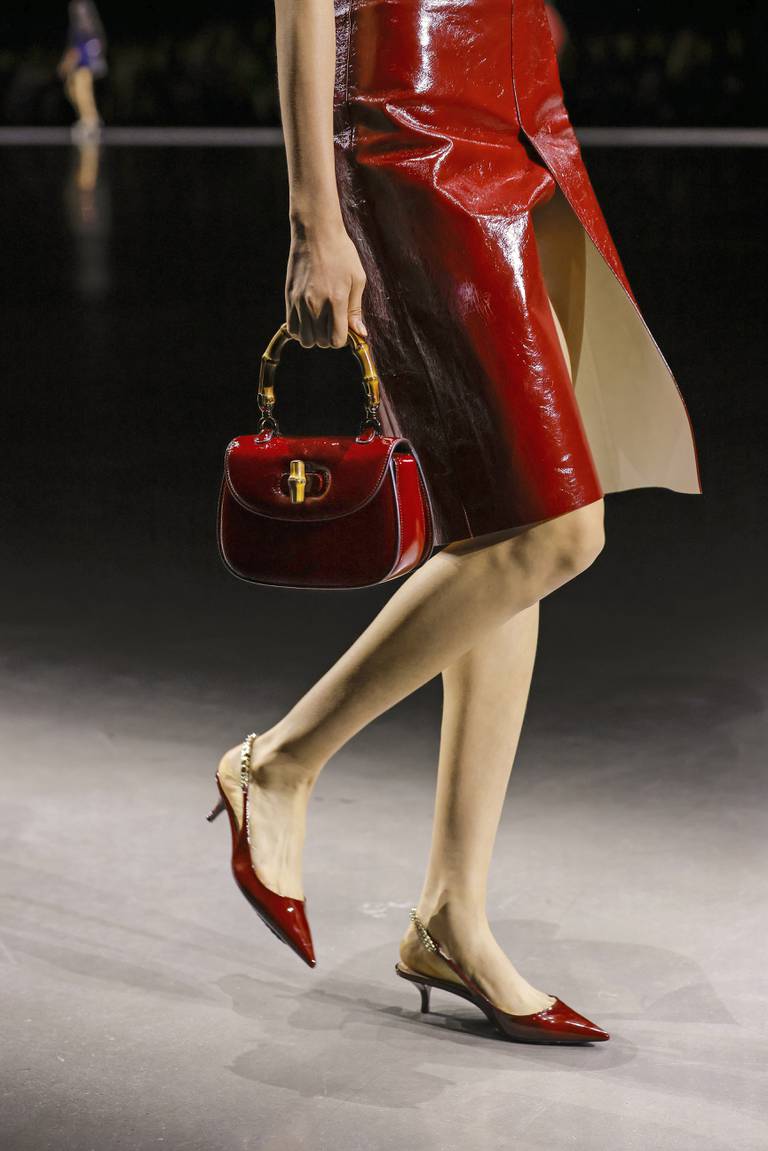 A Bamboo Bag and monogram leather skirt at Gucci's spring-summer 2024 show.