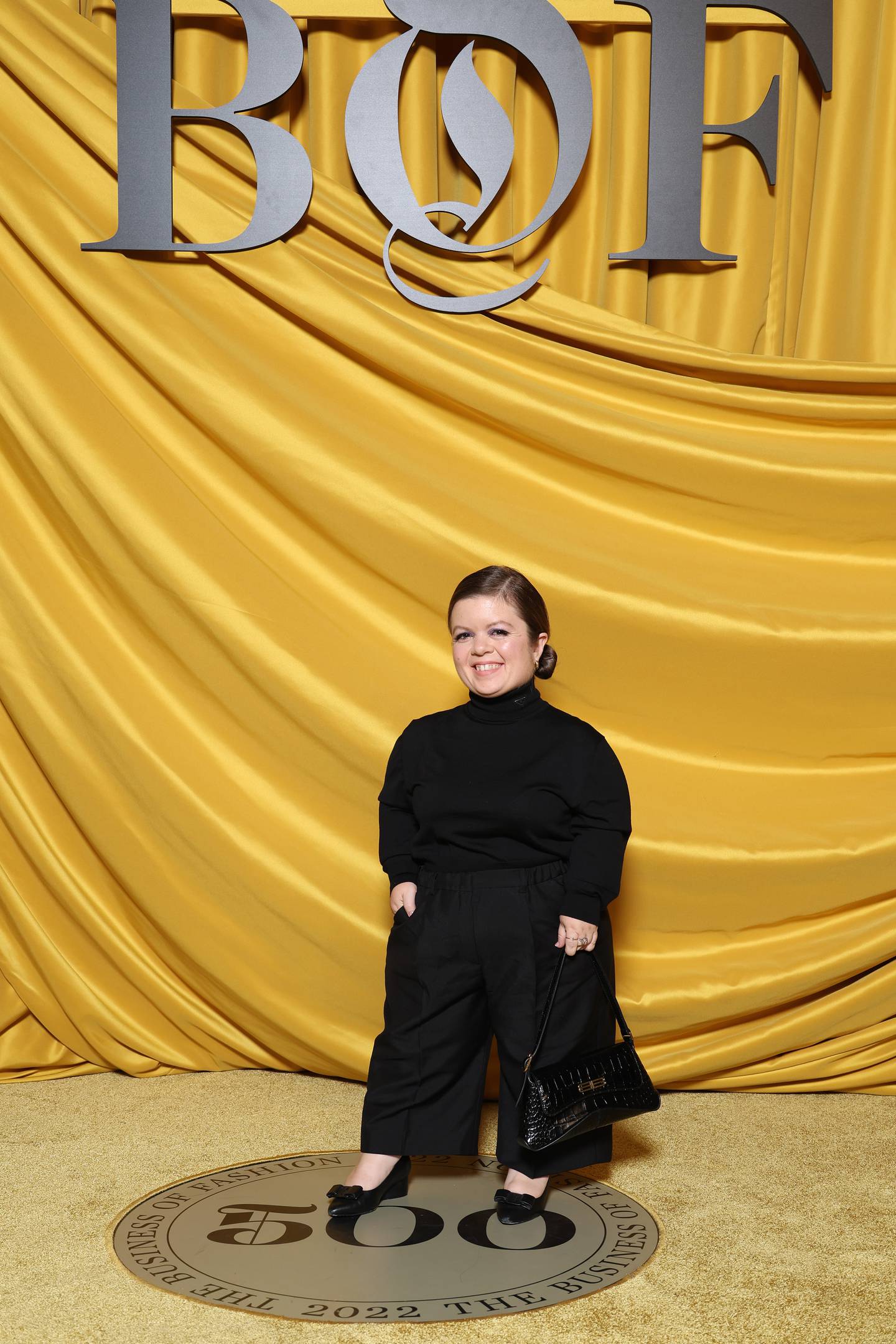 Sinéad Burke, activist, from Ireland, attends the #BoF500 gala during Paris Fashion Week.