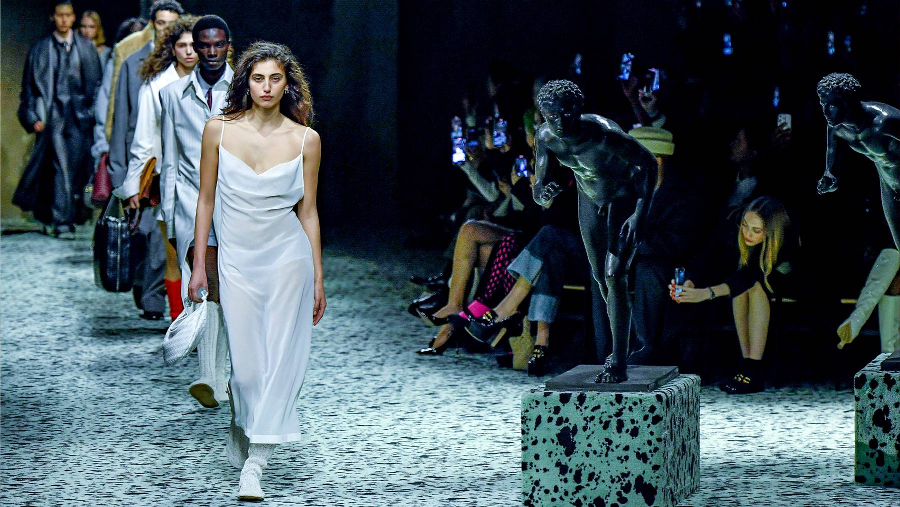 A model walks the runway during the Bottega Veneta Autumn/Winter 2023 fashion show.