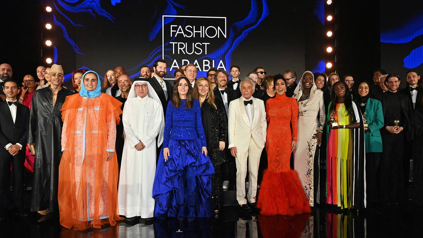 Winners, judges and presenters on stage at the Fashion Trust Arabia Awards 2022 at The National Museum of Qatar.