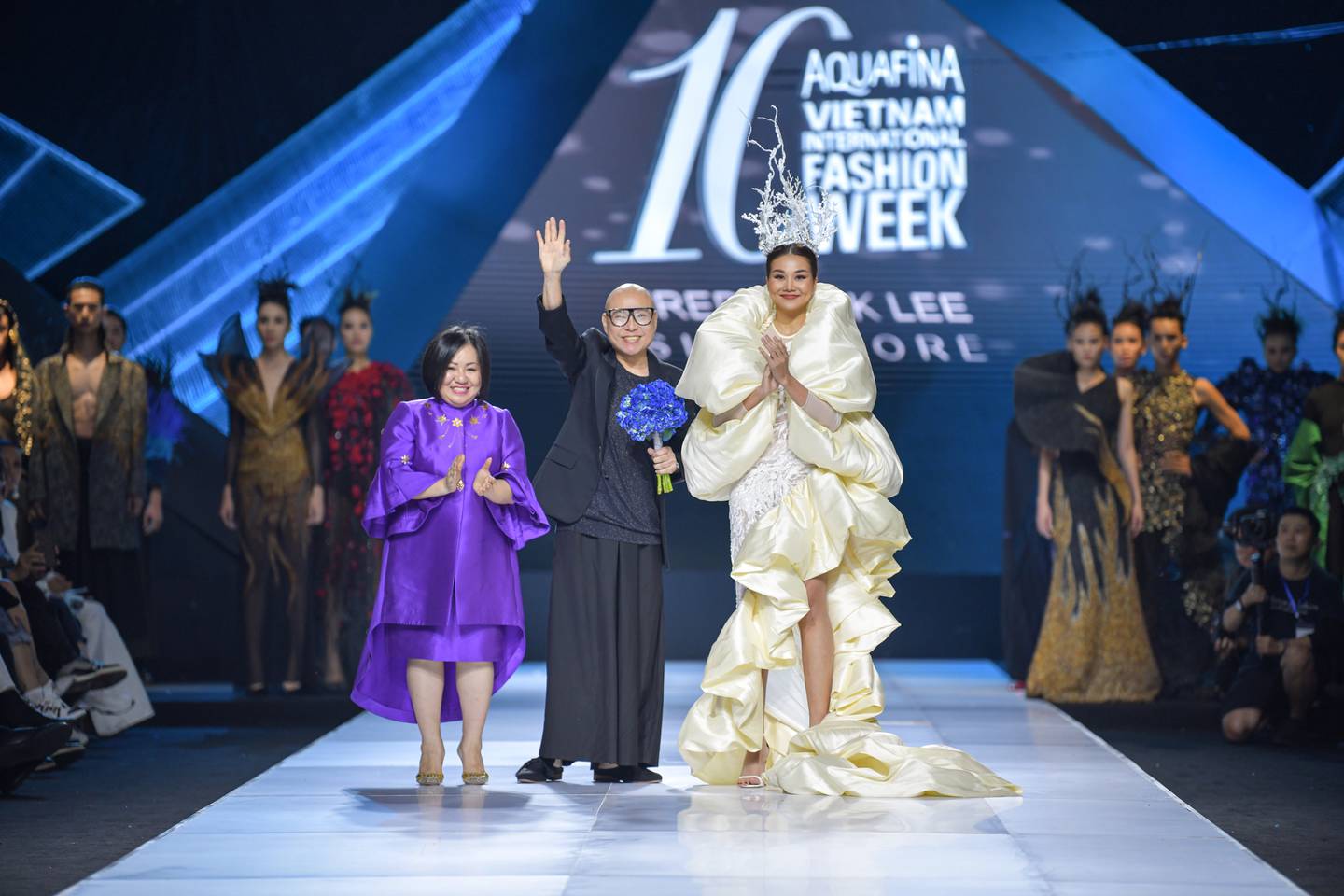 VIFW founder and CEO Trang Le (R) with Singaporean designer Frederick Lee and model Thanh Hang at Aquafina Vietnam International Fashion Week (VIFW) Fall/Winter 2019.