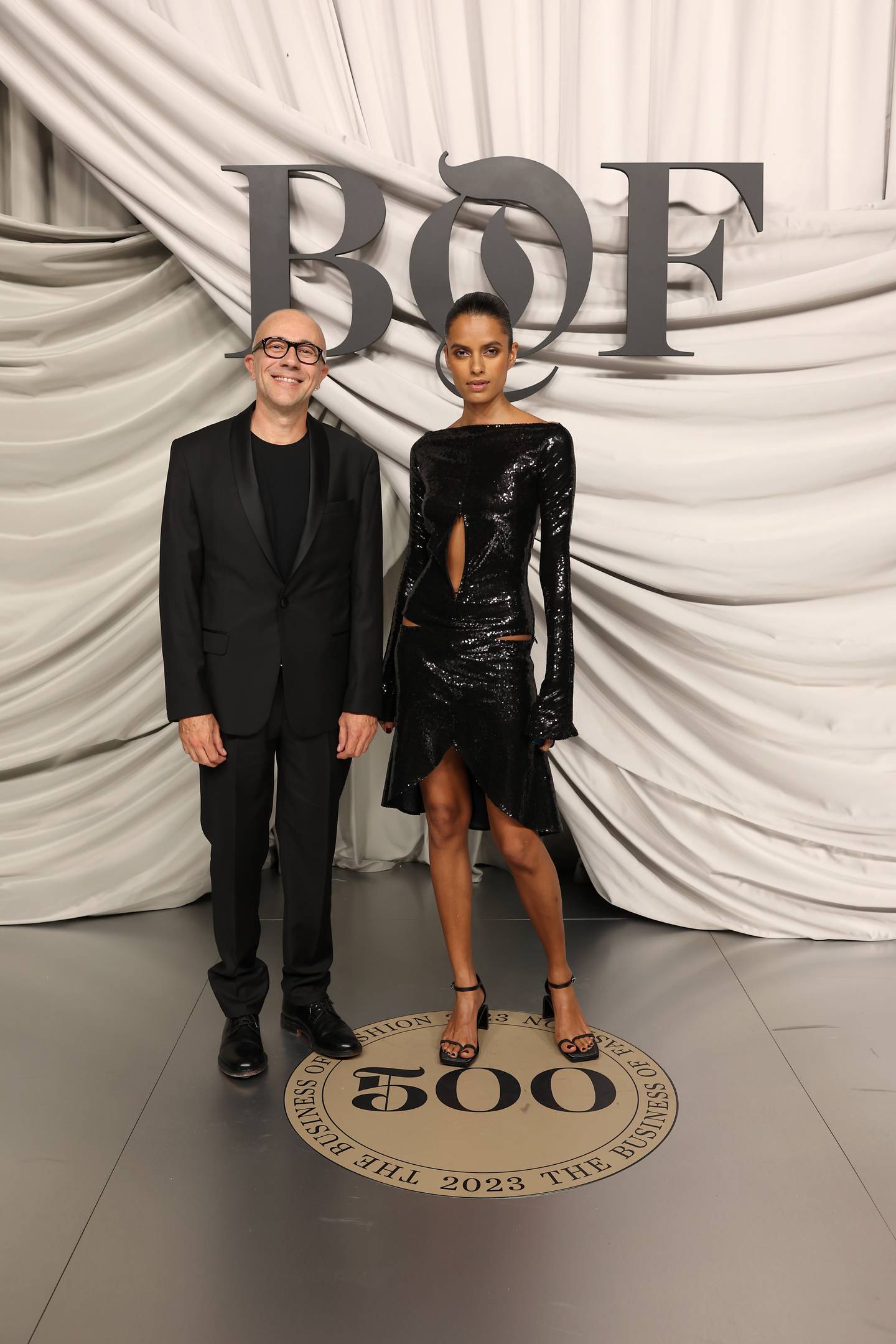 Lakshmi Menon (R) attends the #BoF500 Gala during Paris Fashion Week at Shangri-La Hotel Paris on September 30, 2023 in Paris, France.