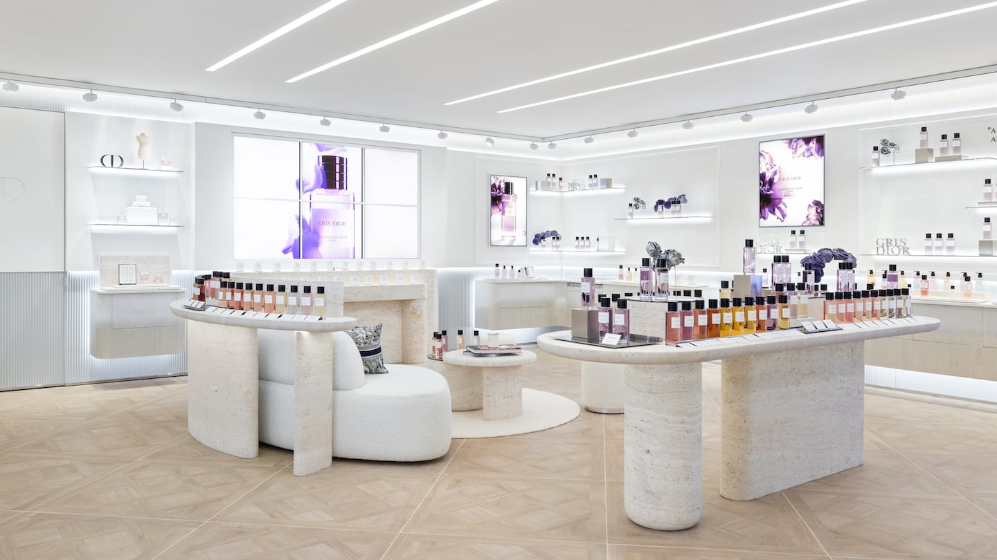 Dior's new travel retail boutique at JFK Airport in New York, featuring bottles of fragrance. (Courtesy)