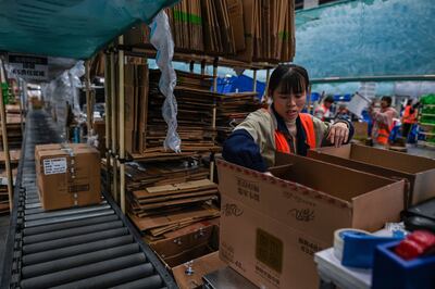 Employees work in a Cainiao warehouse  in Wuxi, China's eastern Jiangsu province, ahead of Singles' Day 2020. Getty Images.
