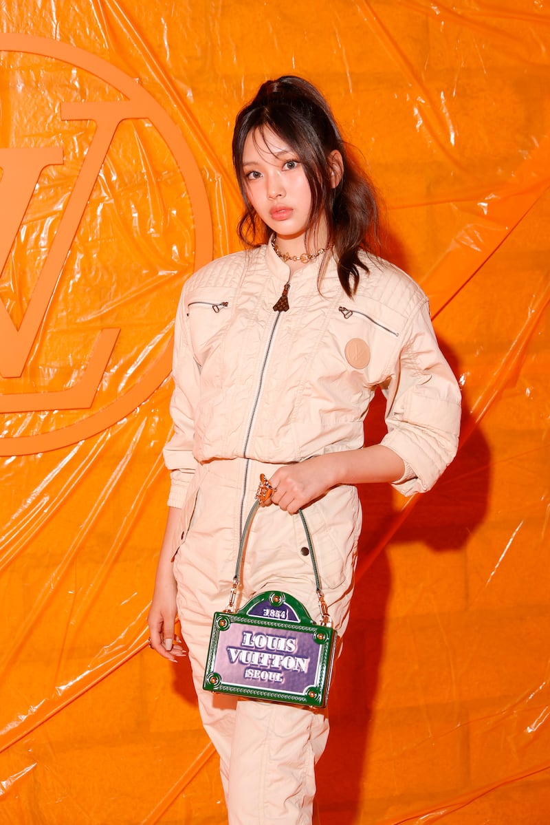 NewJeans member Hyein attends the Louis Vuitton S/S 24 show during Paris Fashion Week in October 2023 in Paris, France.