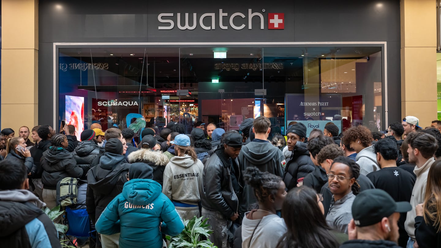 Shoppers crowd around a Swatch store in anticipation of the Swatch x Audemars Piguet collaboration.