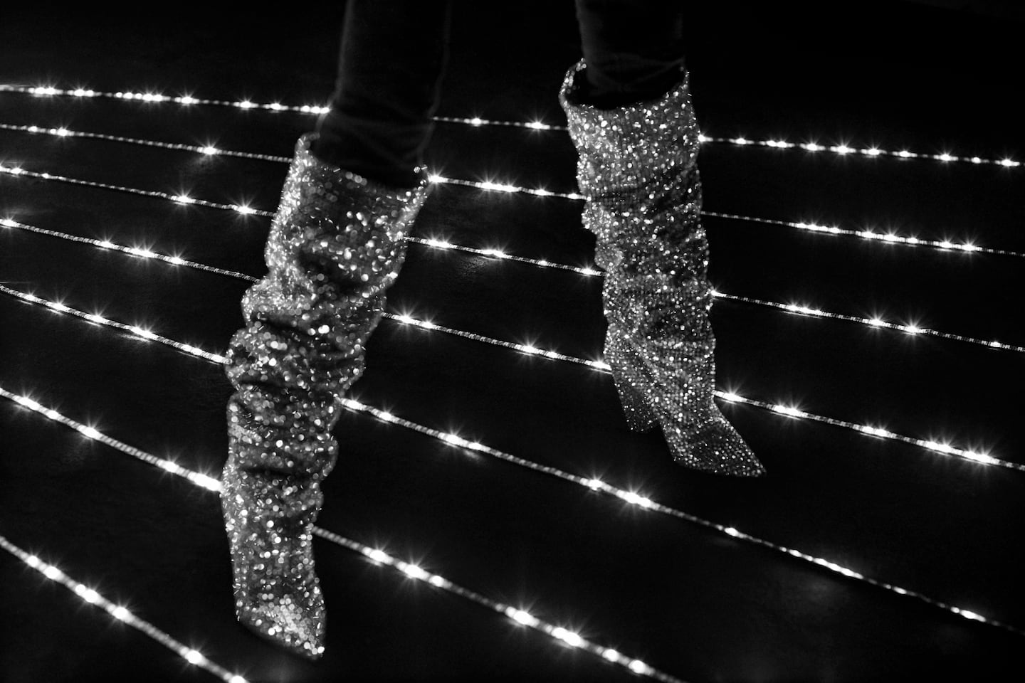 Saint Laurent boots being auctioned in FHCM's benefit for Sidaction.