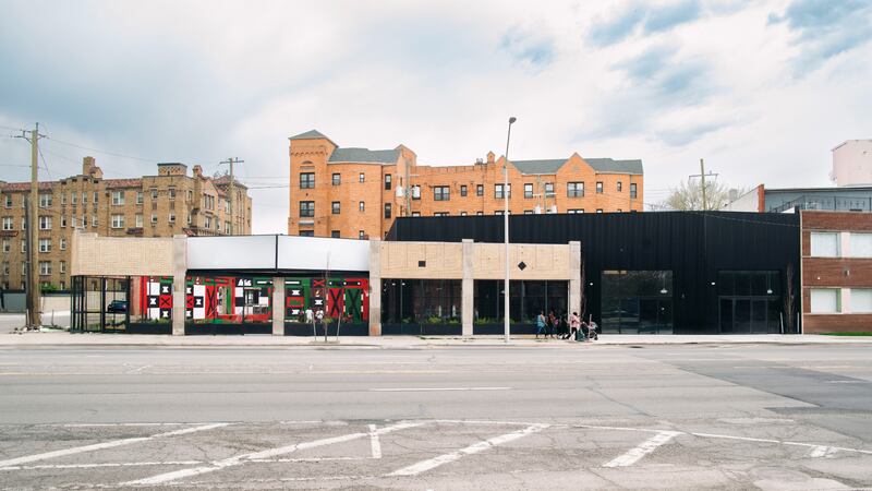 The Whitaker Group's Social Status store in Detroit also includes a courtyard and basketball court for community events.