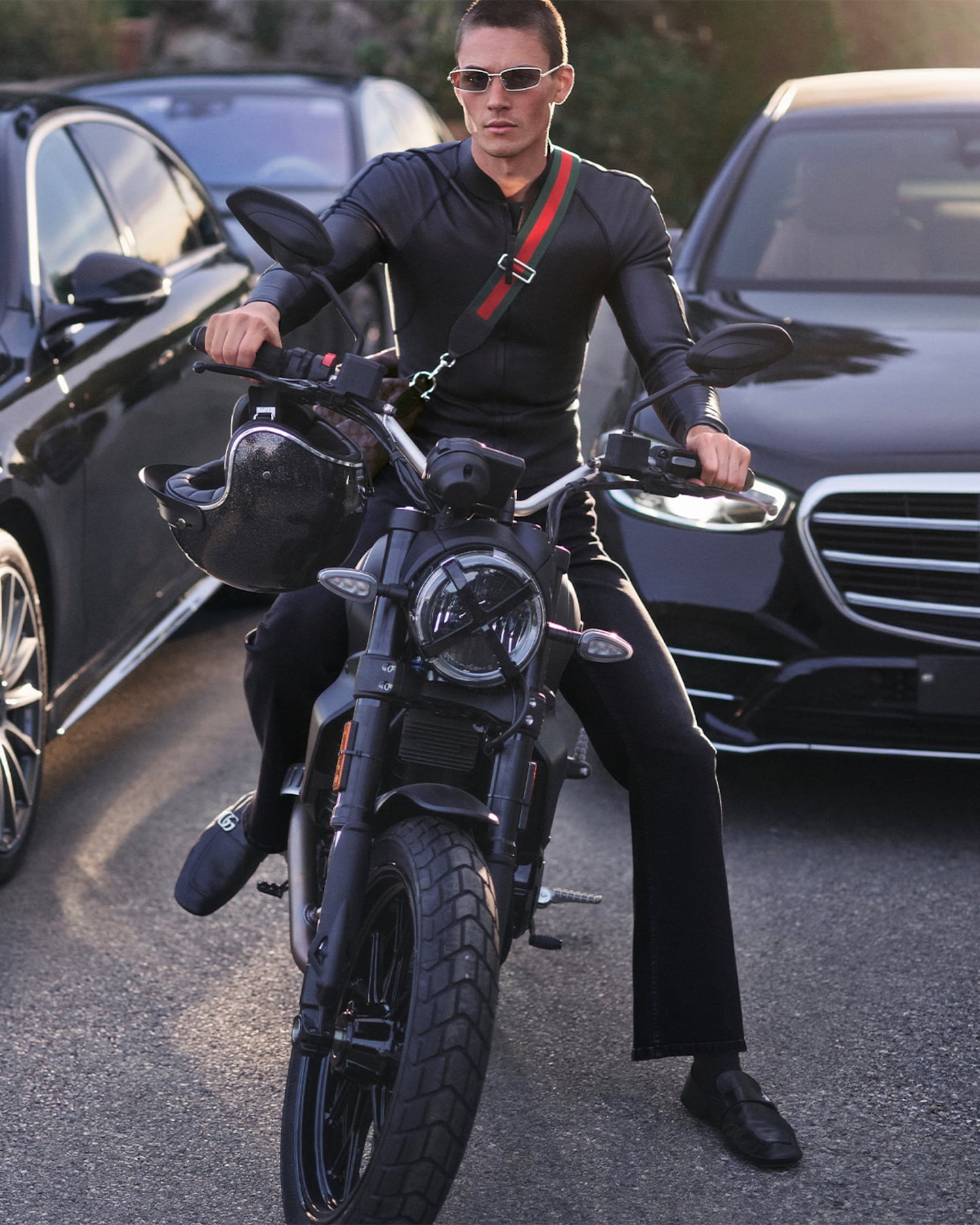 Gucci model on a motorbike in a two-part campaign celebrating its ties to Monte Carlo.