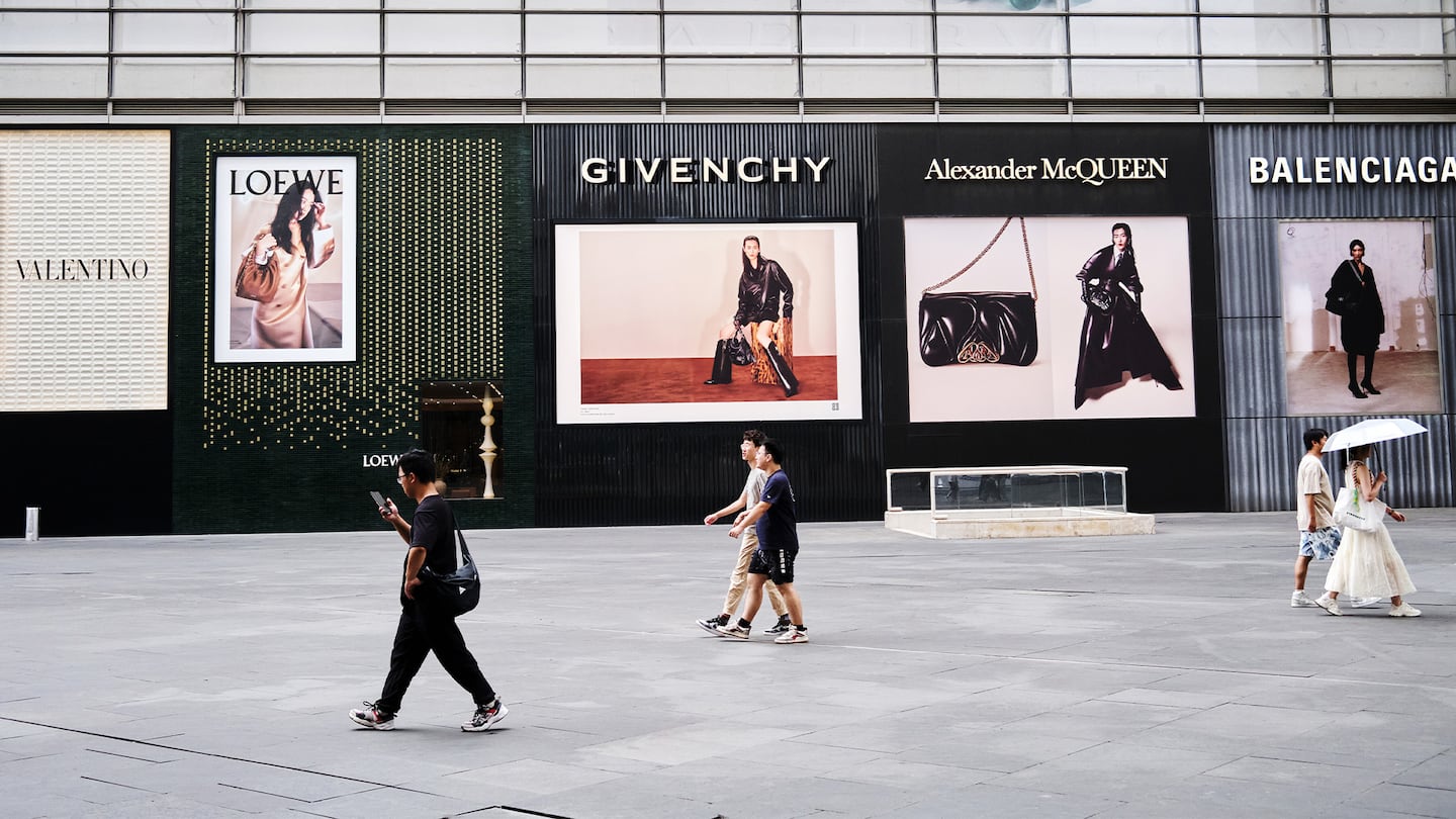 Luxury shoppers in a street.