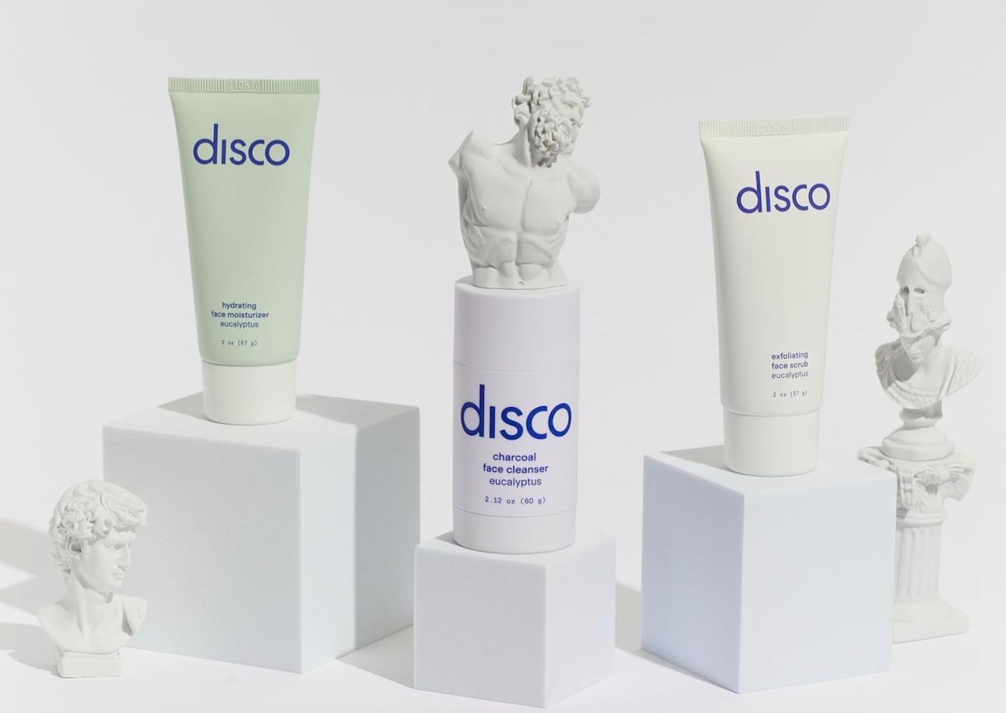 An image of skincare products arranged on small blocks.