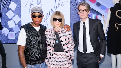 Pharrell Williams, Anna Wintour and Andrew Bolton at the press conference during Paris Fashion Week, which took place in Lagerfeld’s former photography studio.