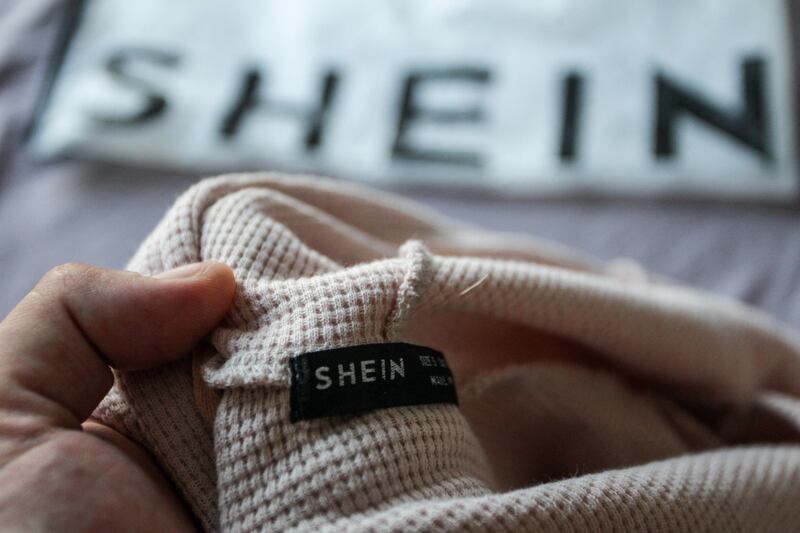 The products contained a range of hazardous substances, including PFAS. Shein label close up.