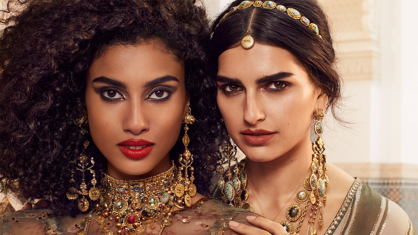 Two women with heavy jewellery