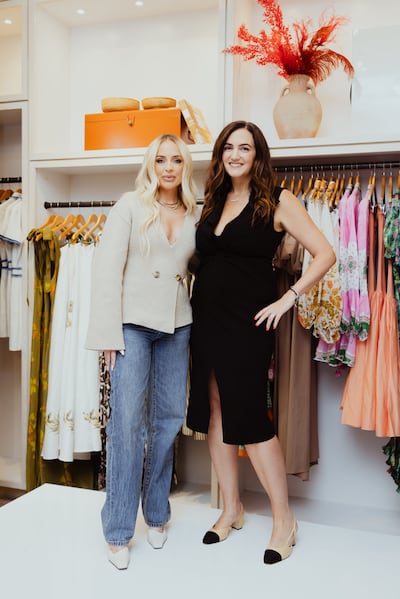 Stylist Maeve Reilly and Jenn Hyman inside the Rent the Runway pop-up event.