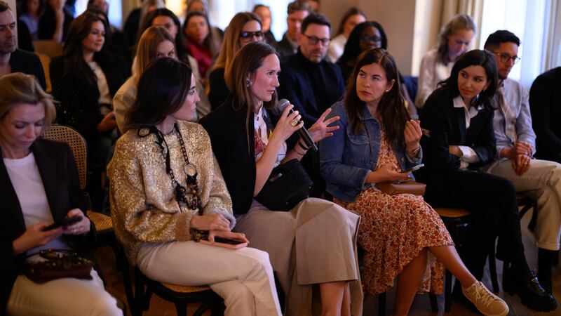 Alexandra Carello, founder and managing director of Alexandra Carello Consulting, questioning the panel on AI applications in luxury.