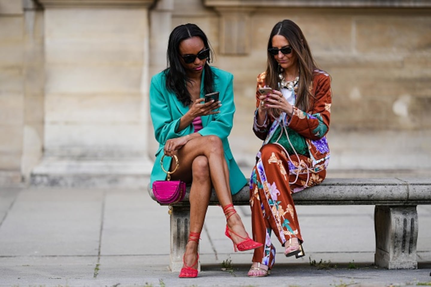 Alba Garavito Torre (R) and Emilie Joseph (L) during a street style fashion photo session in Paris.