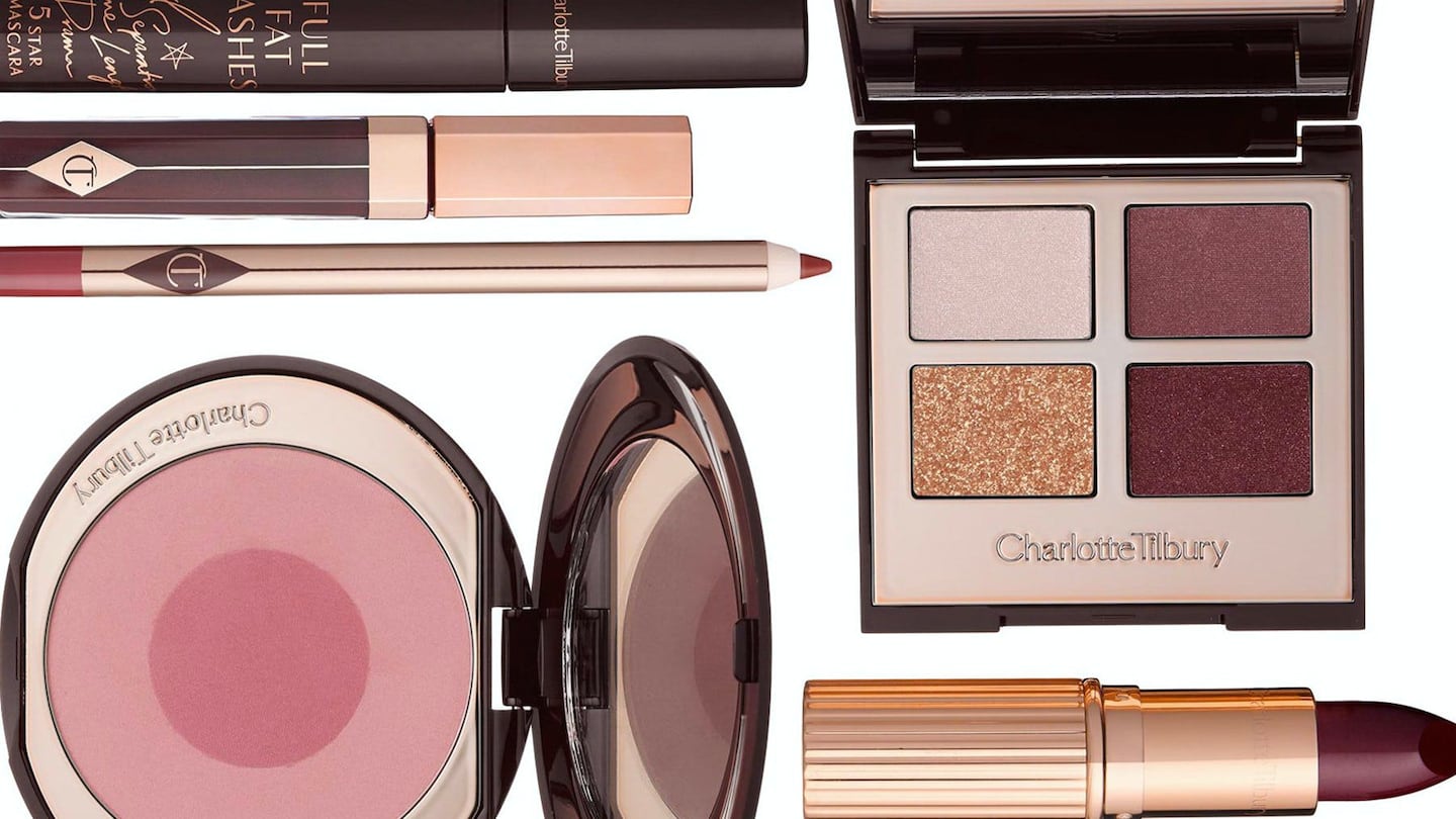 A collage of Charlotte Tilbury makeup, including eyeshadow, lipstick and blush.