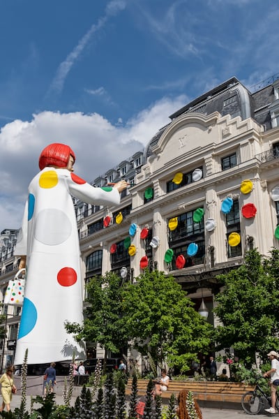 Luxury shopping. Huge sculpture in the likeness of Japanese artist Yayoi Kusama outside Louis Vuitton store, rue du Pont Neuf, Paris, France, Europe. Copy space.