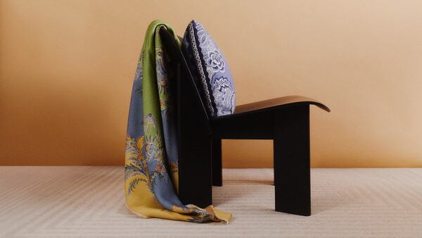 Mytheresa is increasingly focused on selling homeware and design objects like these Etro throw pillows and blankets.