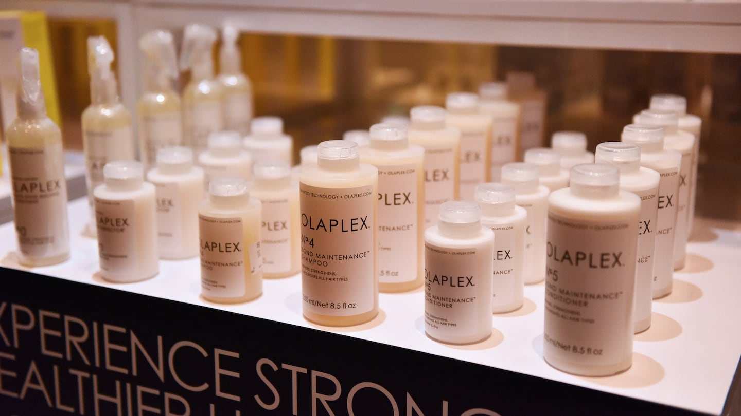 Olaplex products in a retail display.