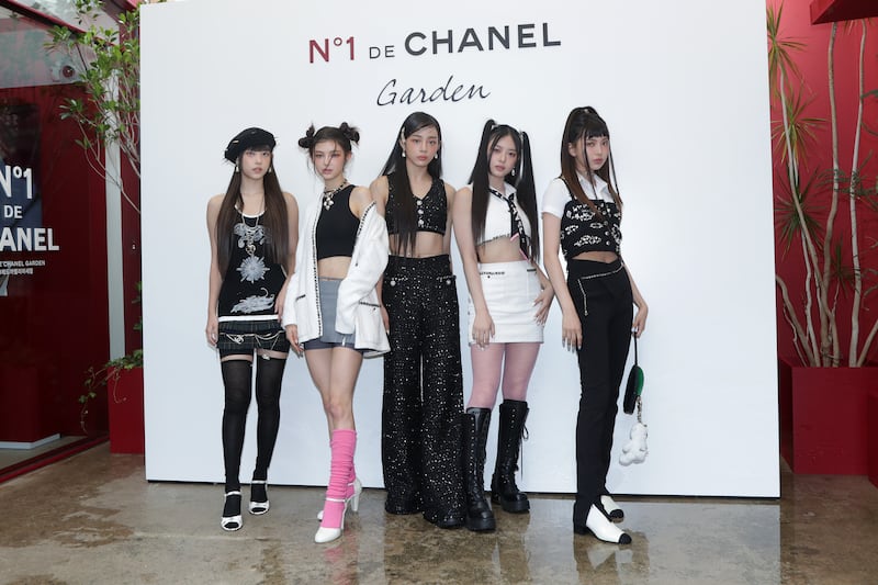 NewJeans members attend the Chanel “N°1 de Chanel Garden” event in Seoul, South Korea in August 2022.