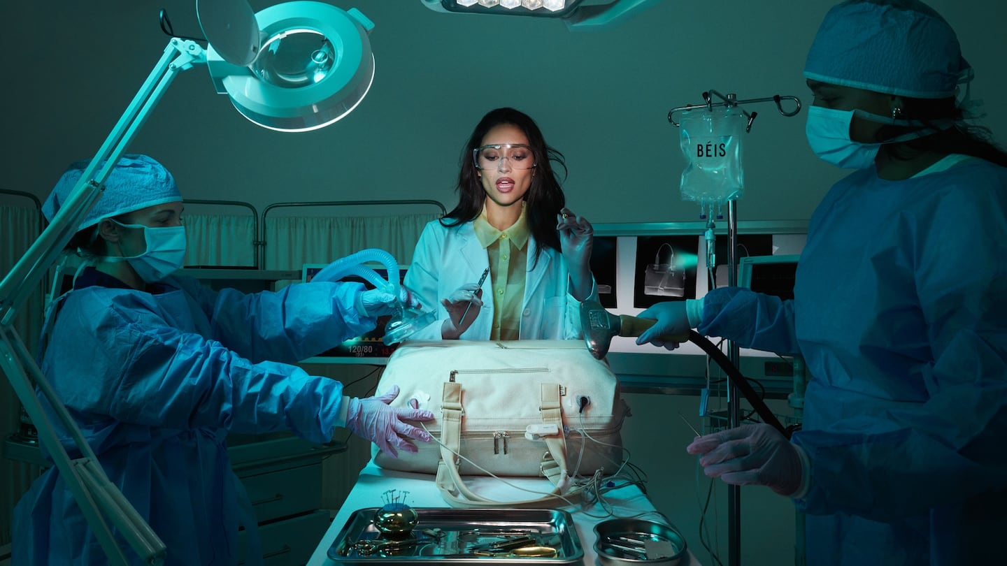 Luggage maker Béis founder Shay Mitchell in an ad for the brand's product relaunch.