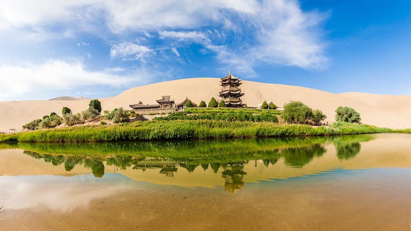 Remote locations in western China like Dunhuang in Gansu province are attracting more affluent tourists.