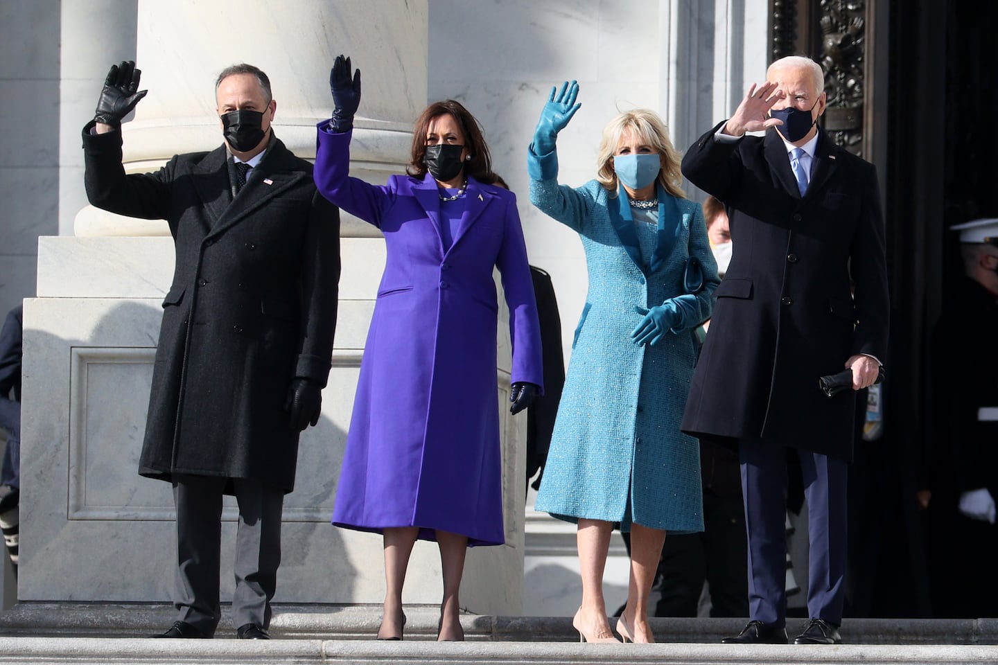 Doug Emhoff, Vice President-elect Kamala Harris, Jill Biden and President-elect Joe Biden wave as they arrive on the East Front at the inauguration. Joe Raedle/Getty Images