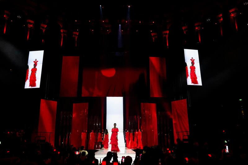 To close the ceremony, models walked the stage wearing red gowns designed by Valentino Garavani.