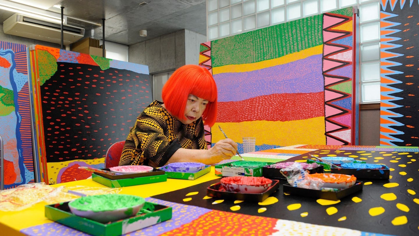 Yayoi Kusama creating paintings for her My Eternal Soul series in her studio, 2014.