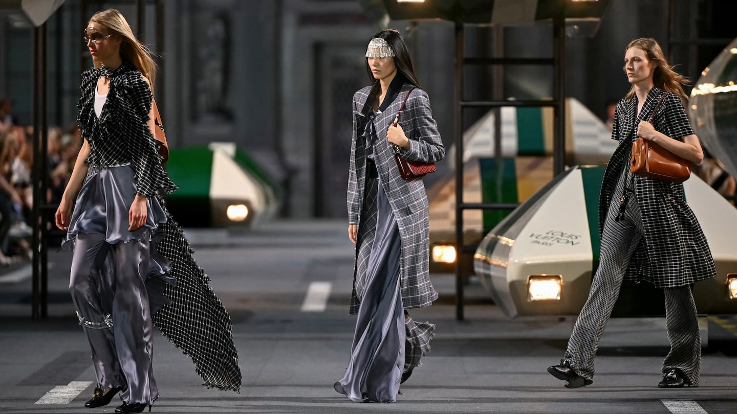 Models walk during the Louis Vuitton show during Paris Fashion Week this month.