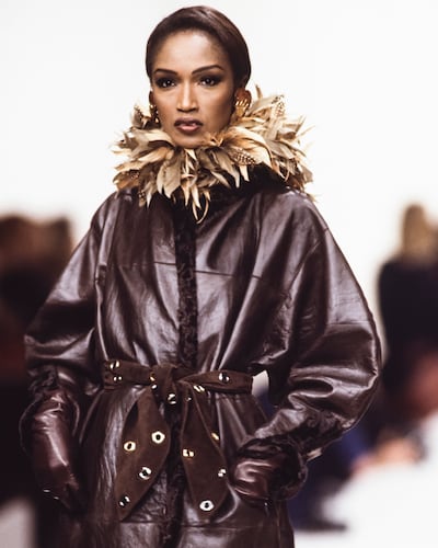 Katoucha Niane walks the runway at Yves Saint Laurent Autumn/Winter 1992.