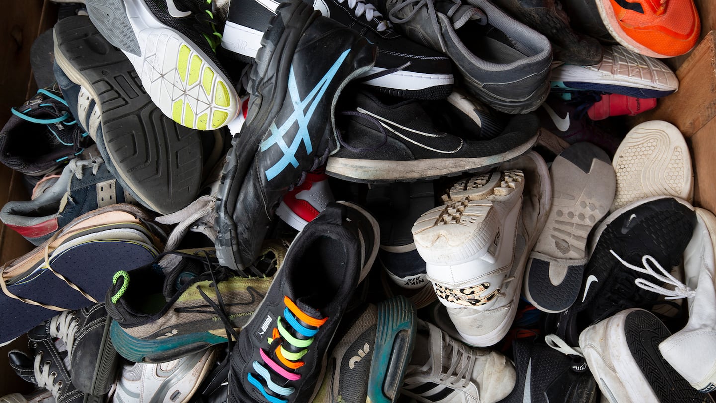 Shoes wait to be recycled at a factory in the Netherlands.