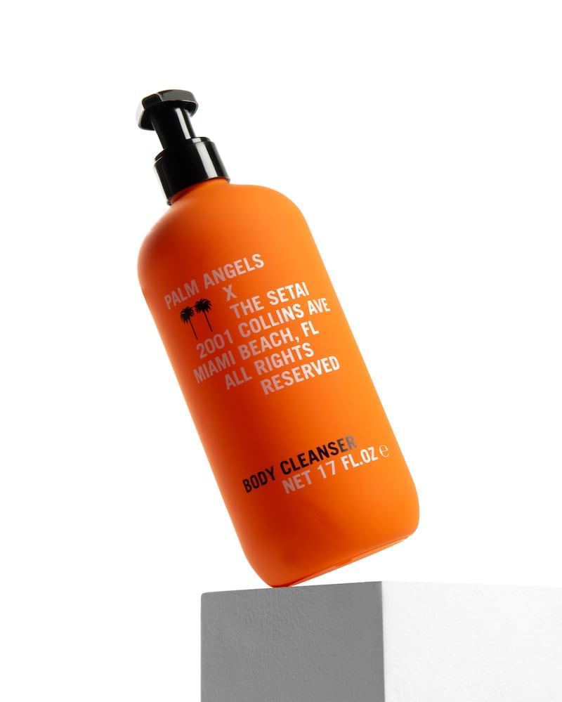 An orange bottle co-branded by Palm Angels and The Setai hotel.