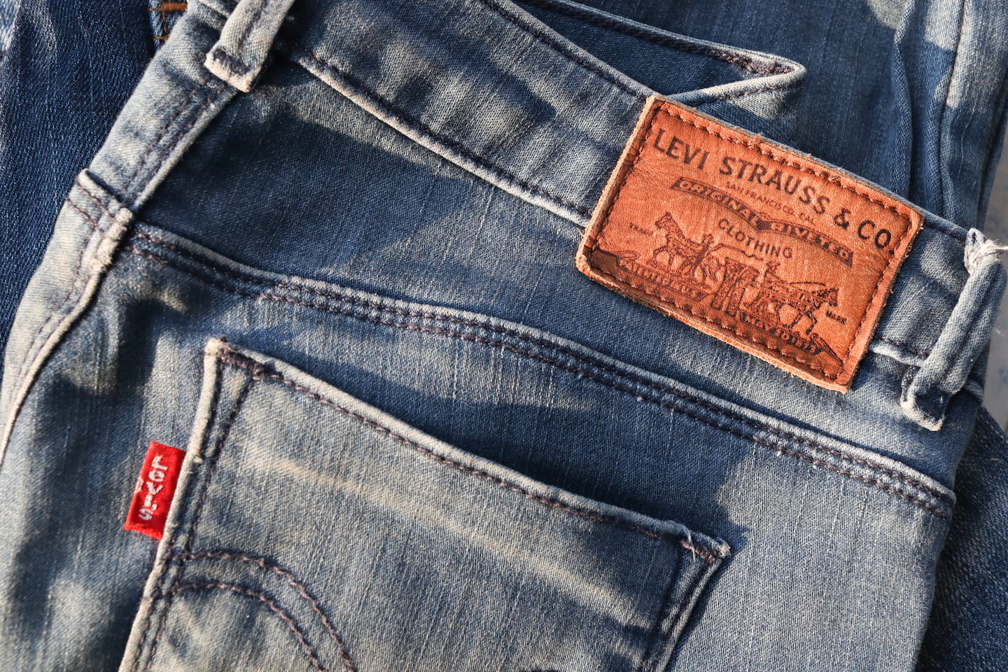 Levi Strauss Sues Italy’s Brunello Cucinelli Over Trademarked Tab | BoF