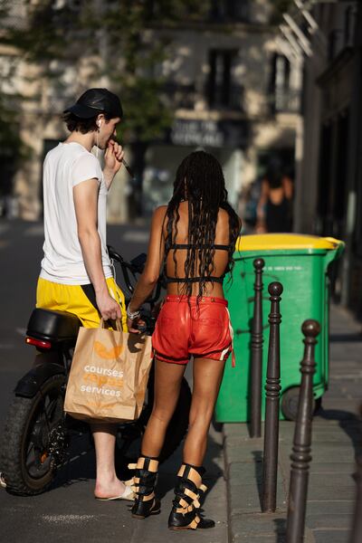 Scott Schuman (@thesartorialist) captured the scene at the Canal Saint-Martin during the Paris heat wave.