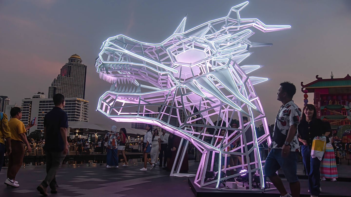 An illuminated sculpture celebrating the year of the dragon in Bangkok's Iconsiam River Park commissioned by Thai mall group Siam Piwat to attract Chinese and other tourists in the January lead-up to the 2024 Lunar New Year.