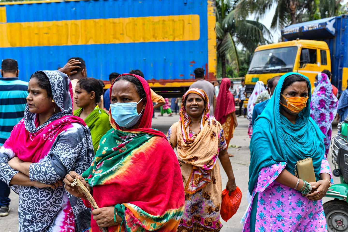 Garment workers of Binni Garments Ltd block the road at a Dhaka factory demanding payment of due wages and Eid bonus.