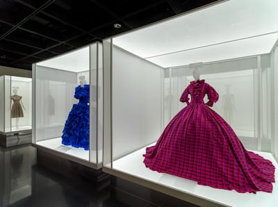 Designs by Rodarte, left, and Christopher John Rogers, right, inside "In America: A Lexicon of Fashion." The Costume Institute