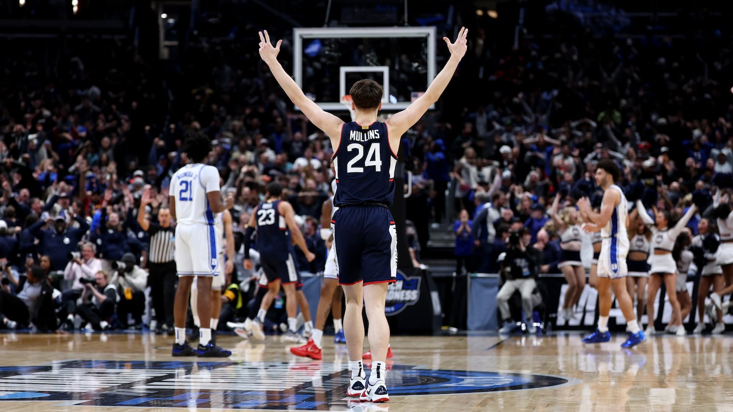 Braylon Mullins #24 of the UConn Huskies celebrates after shooting the game-winning three point basket during the second half of a game against the Duke Blue Devils in the Elite Eight of the 2026 NCAA Men's Basketball Tournament at Capital One Arena on March 29, 2026 in Washington, DC.