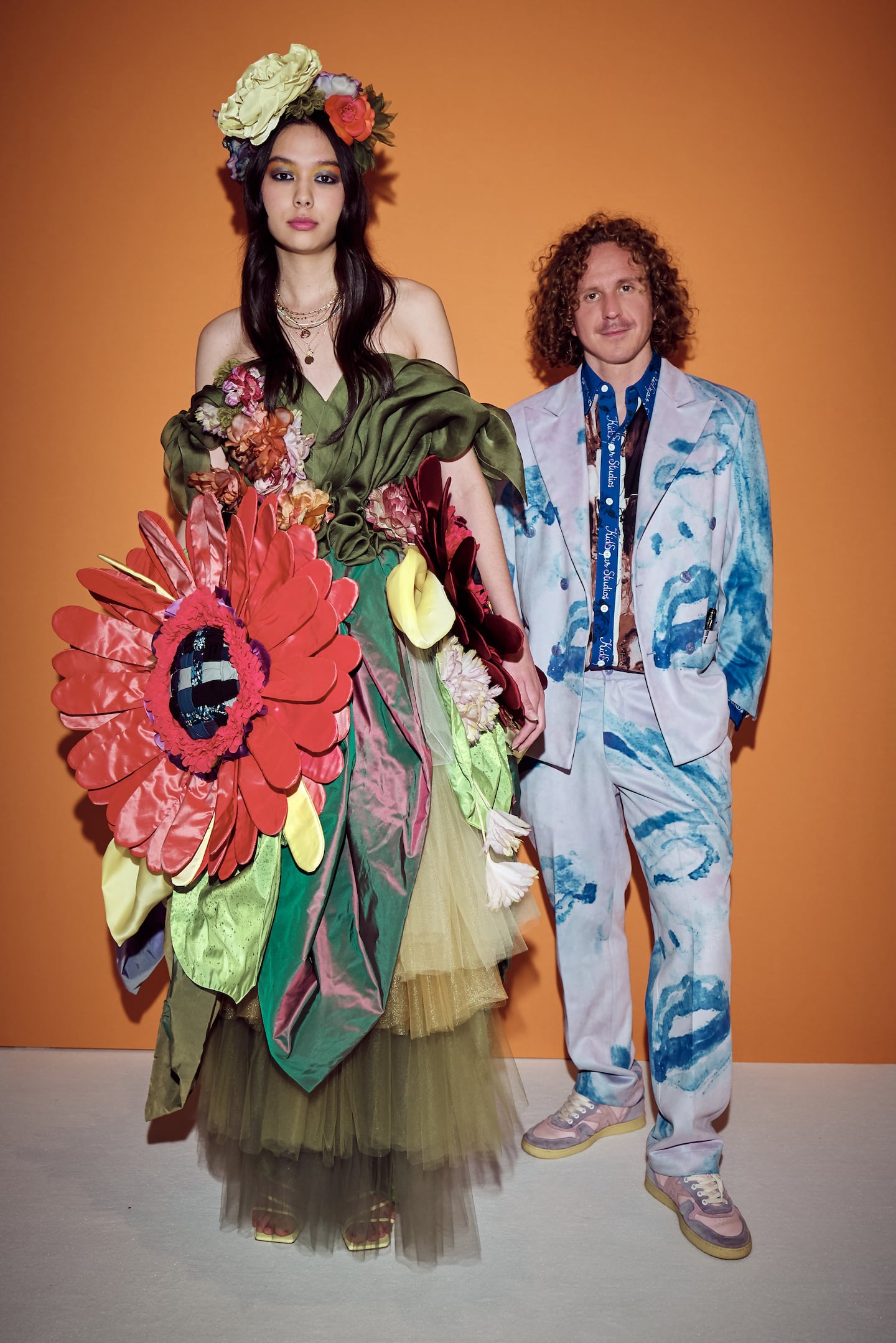 KidSuper designer Colm Dillane poses with a model at the LVMH Prize ceremony in 2021.
