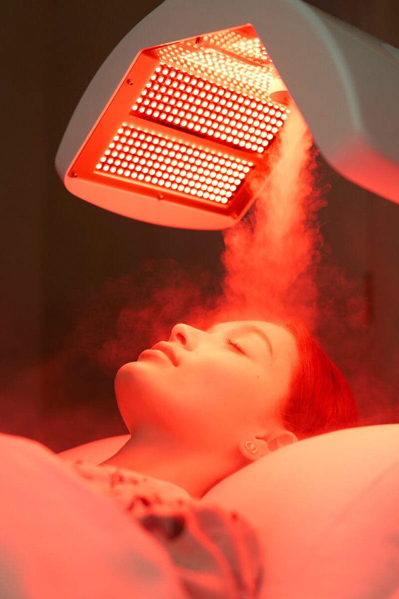A Dior client gets an LED facial