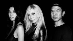 (L-R) Raissa Gerona, Donatella Versace and Michael Mente.