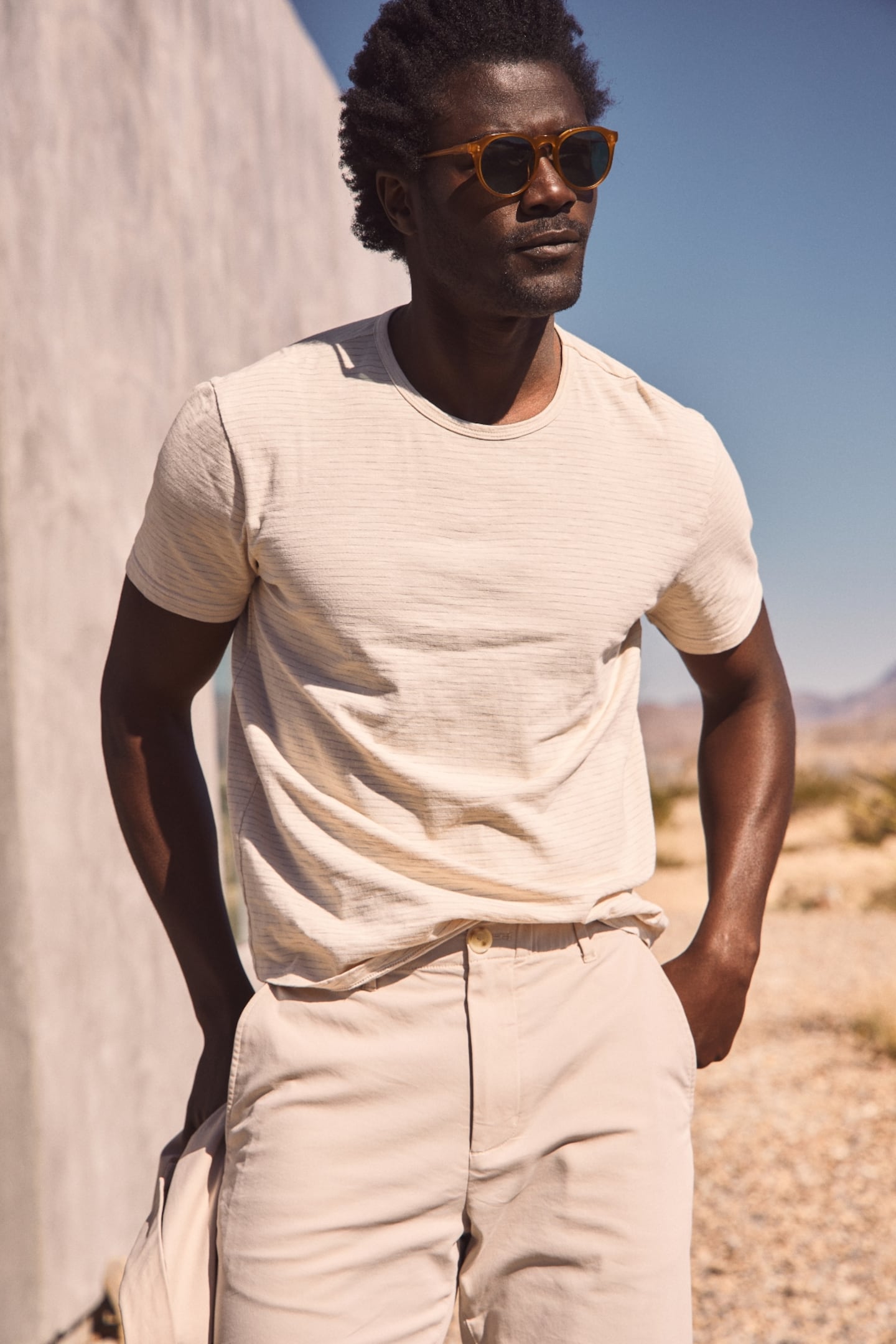 A marketing image of Marine Layer's tailored crew neck tees.