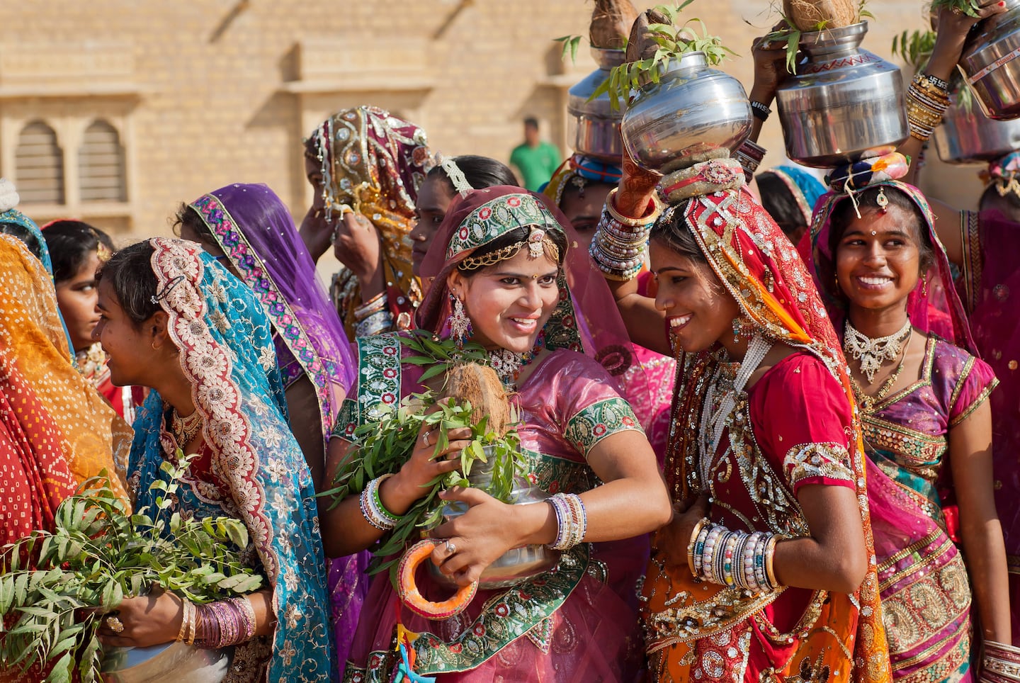 Young women dressed in traditional indian sari at the Desert Festival on March 1, 2015. Shutterstock.