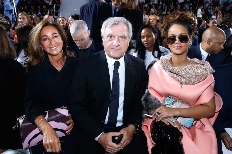 Sidney Toledano, his wife Katia Toledano and singer Rihanna attend the Christian Dior show, Paris Fashion Week Womenswear Spring/Summer 2016.